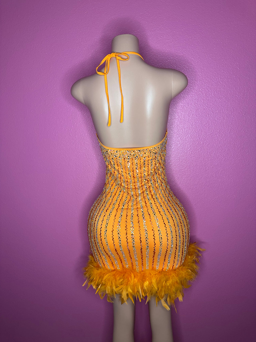 “The baddest” orange bling & feather dress