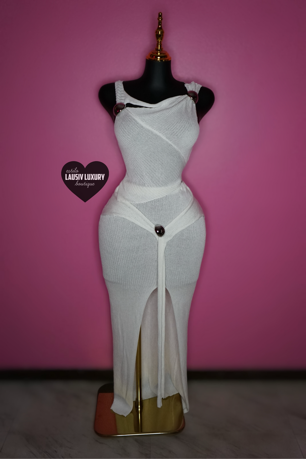 “Tulum” White knit top and skirt set with silver broche embellishments.