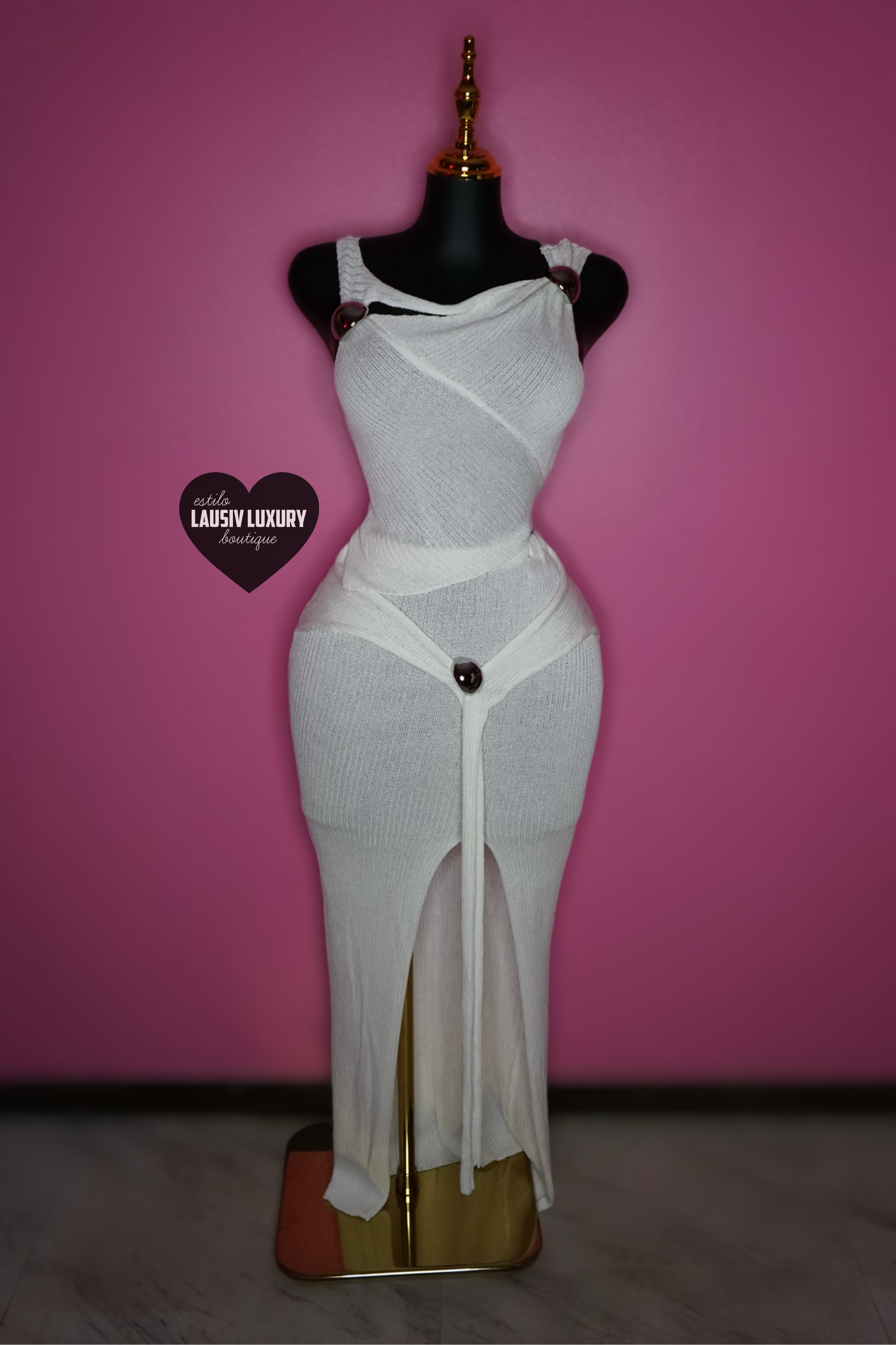 “Tulum” White knit top and skirt set with silver broche embellishments.