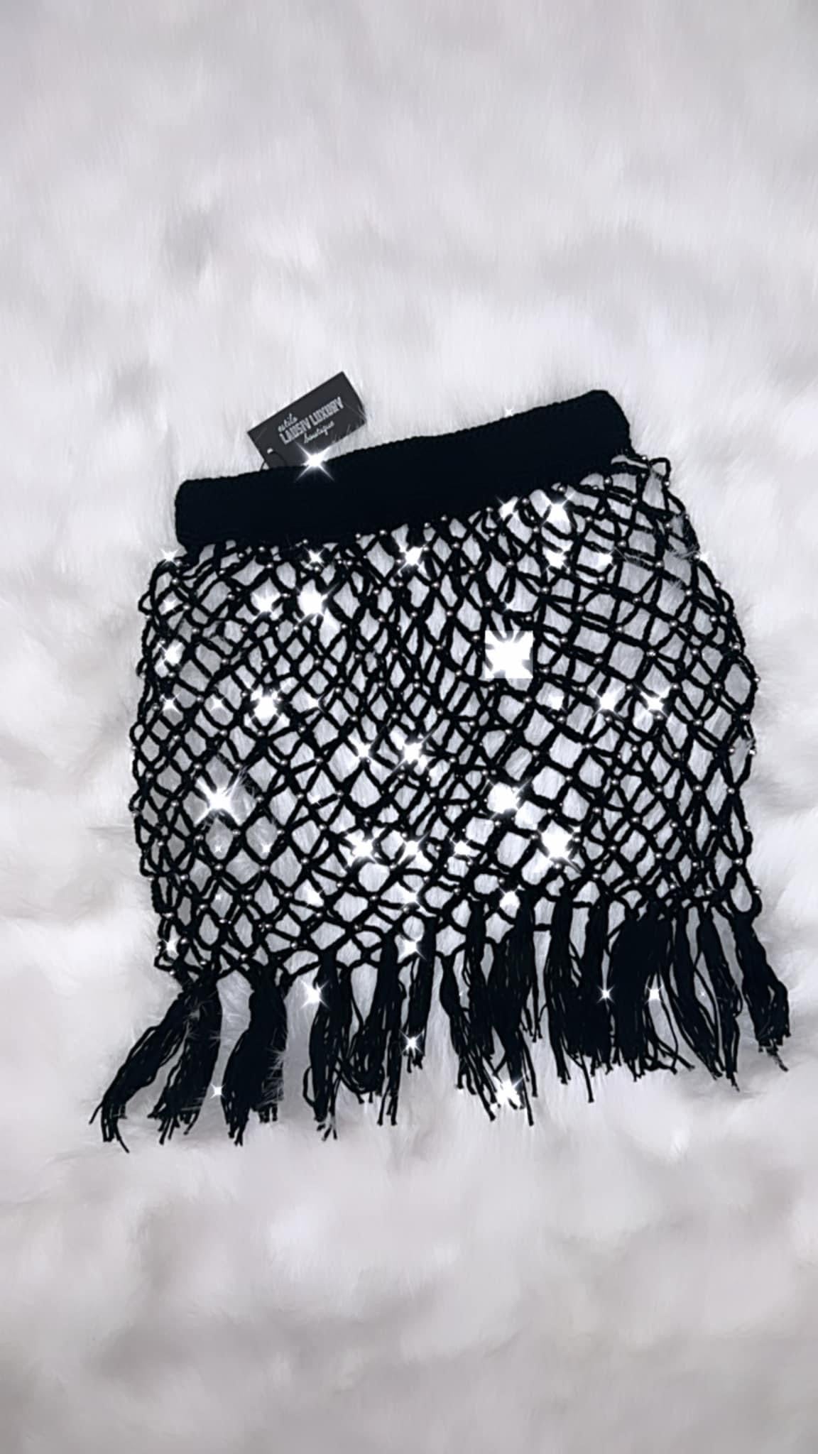Knit fishnet style cutout cover up skirt